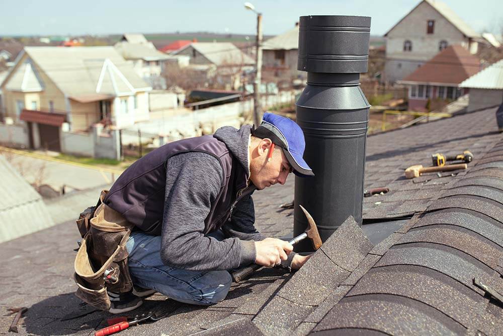 Our Roofing Expert Taking Care of broken shingles