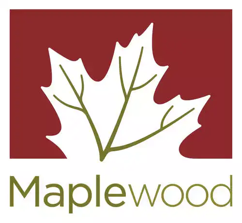 Maplewood MN City logo - maple leaf next to red background