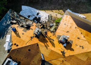 Men building on a roof