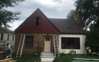 Storm damage inspection on a home exterior in Minnetonka, MN